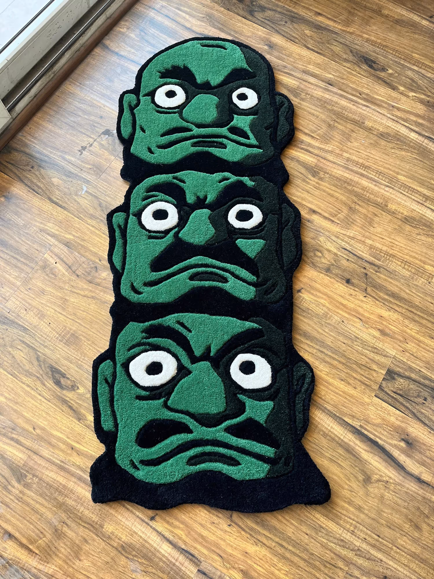 Green Face Hand Tufted Rug  image 1
